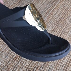Crocs thong sandals with gold embellishments